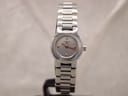 Front view of Tissot ladies' swiss quartz watch with silver dial and stainless steel bracelet.