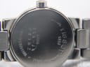 Close-up of the stainless steel case back, engraved with Tissot, SKK-JA G331K, Water Resistant 30m, and Sapphire Crystal.