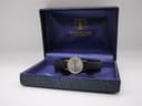 The Tissot Stylist watch presented within its original blue textured Tissot presentation box.