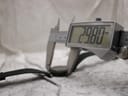 Digital caliper measuring the Tissot RockWatch case diameter, displaying 29.80 mm.