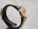 Another side angle of the Gucci 2000L watch, highlighting the watch's profile and textured case side.