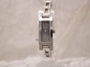 Front view of Gucci 3900L ladies watch with silver-grey dial and stainless steel bracelet.