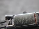 Close-up of the case back engraving, showing 'Gucci', '3900L', 'Swiss Made', 'Stainless Steel', 'Water Resistant 3 ATM', and serial number.