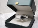 The Gucci 1500L watch neatly presented inside a dark green watch box with cream interior.