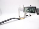 Digital caliper measuring the case diameter of the Gucci 3000 Jr watch, displaying 29.00 mm.