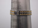 The Gucci 9000 L watch bracelet wrapped around a wrist sizing cone, indicating a maximum wrist circumference of 150mm.