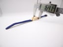 Digital caliper measuring the width of the watch case, displaying a precise measurement of 16.41 mm.