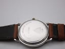 Rear full length view of the Gucci watch, focusing on the case back and strap.