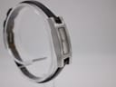 Another angled view of Gucci 3900L watch, highlighting the rectangular stainless steel case and strap.