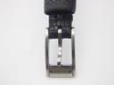 Close-up of the polished stainless steel buckle, clearly engraved with 'Gucci' text.