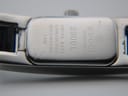 Close-up of the stainless steel case back, showing "Gucci timepieces", "Swiss Made", "Stainless Steel", "Water Resistant 3 ATM", "3900L", and serial number "0203670".