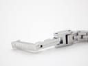 Close-up of the signed Gucci stainless steel deployant clasp on the watch bracelet.