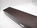 Exterior view of the original dark brown Gucci presentation box with the Gucci logo embossed on the lid.