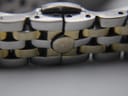 Close-up of the Roamer signed fold-over clasp on the two-tone stainless steel bracelet, showing the 'R' logo.