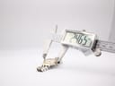 A digital caliper measuring the case diameter of the Roamer watch, displaying a precise reading of 24.6 mm.
