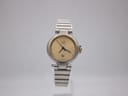 Front view of Dunhill ladies watch with gold dial and two-tone bracelet on a white background.