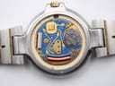 Close-up of the opened case back revealing the Dunhill-signed ETA 976.001 quartz movement and Renata battery.