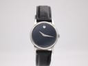 Front view of Movado Museum watch with black dial and silver case on a white background, highlighting the single silver dot at 12 o'clock.