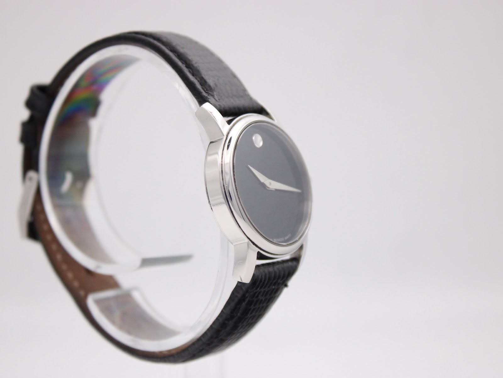 Another angled side view of the Movado Museum watch, emphasising the sleek lines of the case and the simple, elegant dial.