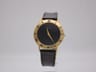 Gucci 3000.2.M men's quartz watch, gold tone with black minimalist dial & original leather strap, Swiss made vintage