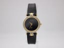 Front view of Gucci 4500L ladies watch with black dial and two-tone case on a display stand.