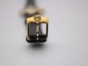 Close-up of the gold-tone buckle, featuring the iconic interlocking Gucci G logo.