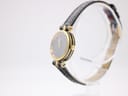 Side profile of Gucci 2000L with original signed crown