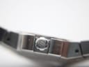 Close-up of the crown, featuring the distinctive Maurice Lacroix 'M' logo, on the side of the watch case.