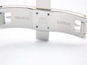Close-up of the polished stainless steel deployment clasp, engraved with 'Maurice Lacroix'.