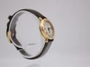 Another angled side view of the Gucci 3800L watch on a display stand, highlighting the case design.