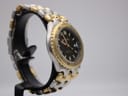 Left side view of the Ellesse watch on a stand, showing the curved case profile and bracelet links.