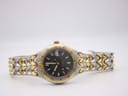 Full front view of the Ellesse watch with its two-tone bracelet laid flat against a white background.