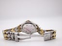 Rear view of the Ellesse watch showing the case back and the open two-tone bracelet clasp.