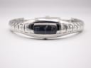 Front view of the Maurice Lacroix watch dial from a lower angle, showing reflections on the sapphire crystal and the silver dial.
