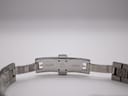 Close-up of the open clasp, showing "MAURICE LACROIX" logo and brand name engraved on the inner side of the steel.
