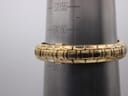 The Maurice Lacroix gold-plated bracelet watch on a wrist sizing gauge, indicating a maximum wrist circumference of 160mm.
