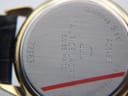 Close-up of the watch case back, revealing "Maurice Lacroix Swiss Made", "Stainless Steel", model "72963", serial "AC84818", and "Water Resistant" engravings.