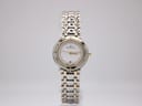 Front view of the Maurice Lacroix ladies' watch with a white dial, gold-tone bezel, and two-tone bracelet, centered on a light background.