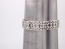 Watch bracelet on a wrist sizing cone, showing a circumference measurement of approximately 183mm or 18.3cm.