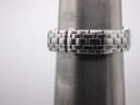 Watch bracelet on a sizing gauge, indicating a wrist circumference measurement of approximately 150mm.