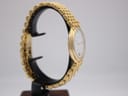 Another side view of the Maurice Lacroix watch on a display stand, showing the case profile and the gold electroplated bracelet.