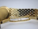 Close-up of the gold electroplated bracelet clasp, showing 'Maurice Lacroix' signature.