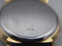 Close-up of the polished stainless steel case back with faint circular brushing and the engraved model number '226'.