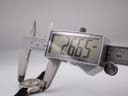 Digital caliper display showing the watch case diameter at 26.65 mm.