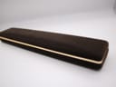 Exterior view of the brown velvet presentation box.
