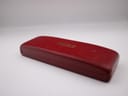 Top view of the closed original dark red Rone presentation box with "RONE" logo in gold lettering.