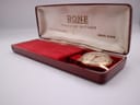 The Rone automatic watch nestled in its original dark red Rone presentation box with cream satin lining.