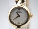 Close-up front view of the Michel Herbelin Paris dial, showing the white mother of pearl face, gold hands, XII Roman numeral, gold dot markers, and 'France' text.