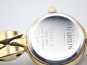 Close-up view of the polished stainless steel case back of the Michel Herbelin watch, showing model reference 17081.B, 'Swiss Movt', 'Made in France', and '30 m' water resistance.