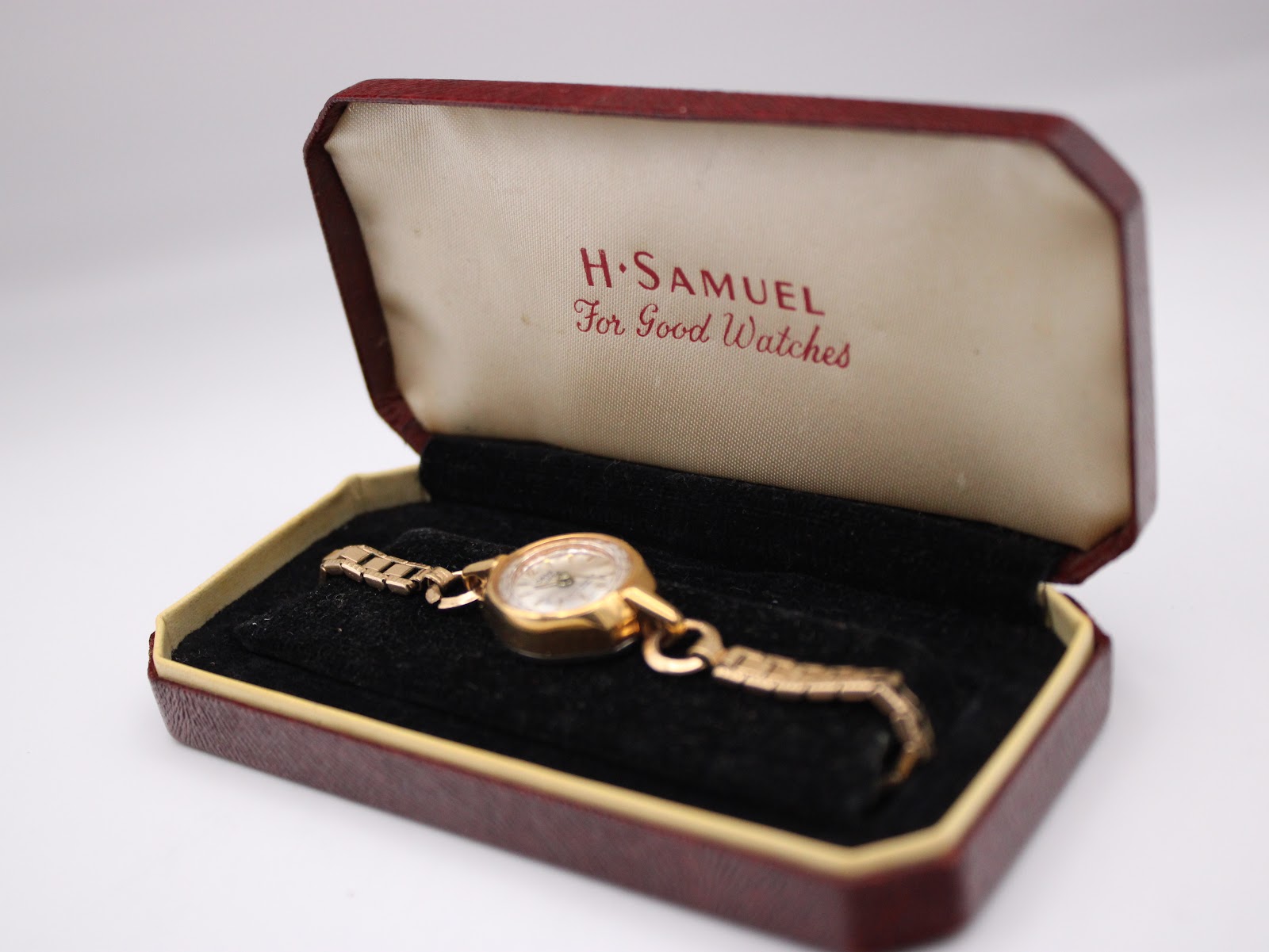 Oris Super watch placed inside a vintage H. Samuel presentation box.